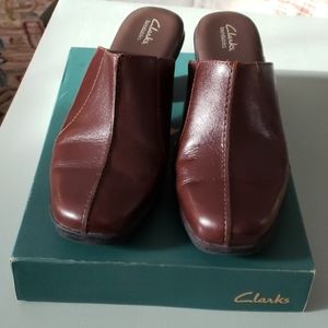 Clarks Mules size 7